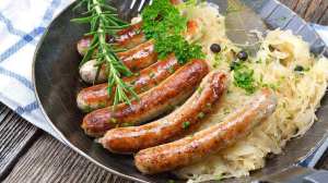 sausages and onions in a pan