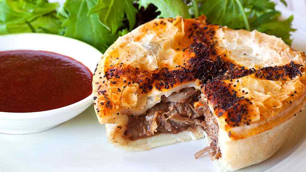 meat pie and tomato sauce