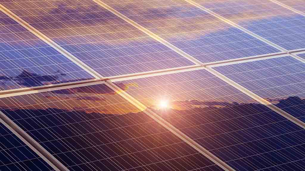 sunset reflected on solar panels