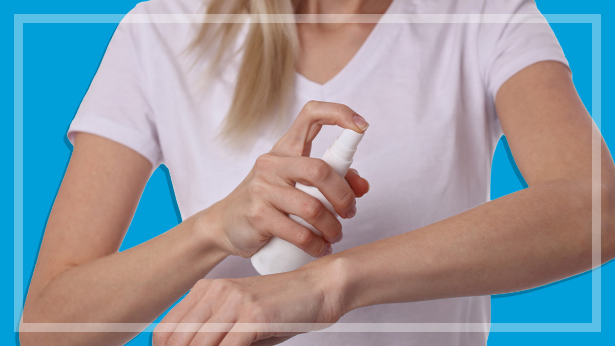 woman_spraying_insect_repellant
