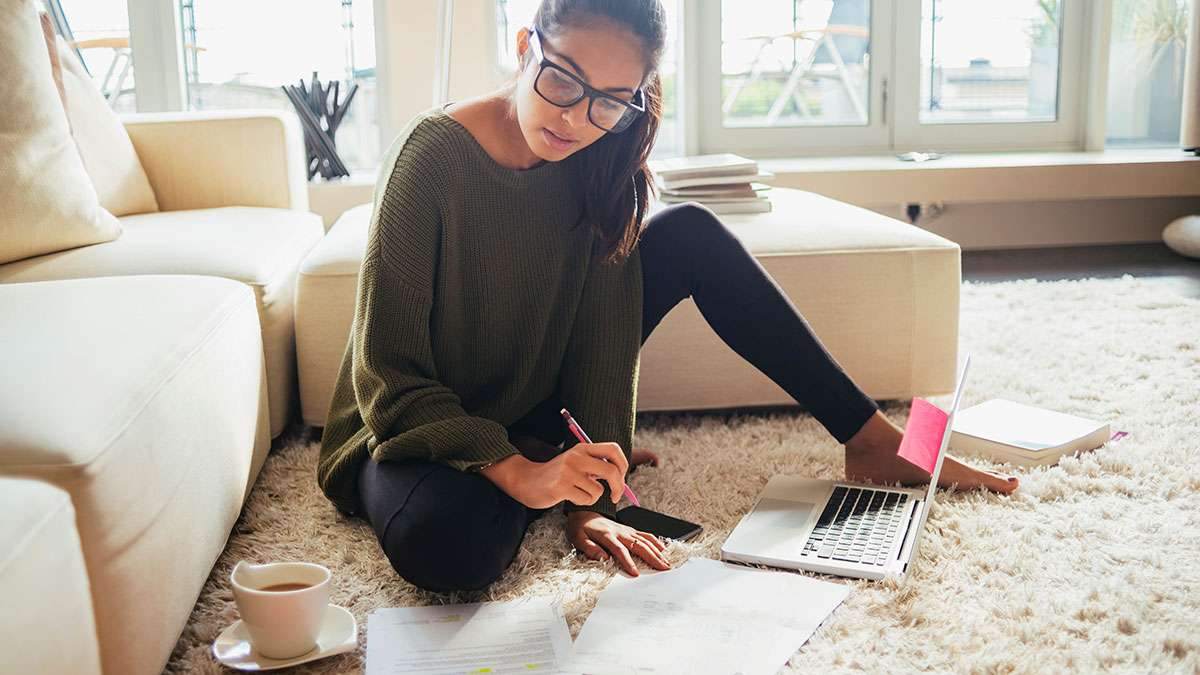 young person checking finance