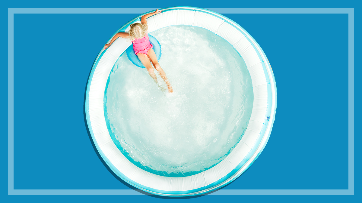 child sitting in an inflatable pool