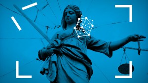 scales of justice with facial recognition frame overlay