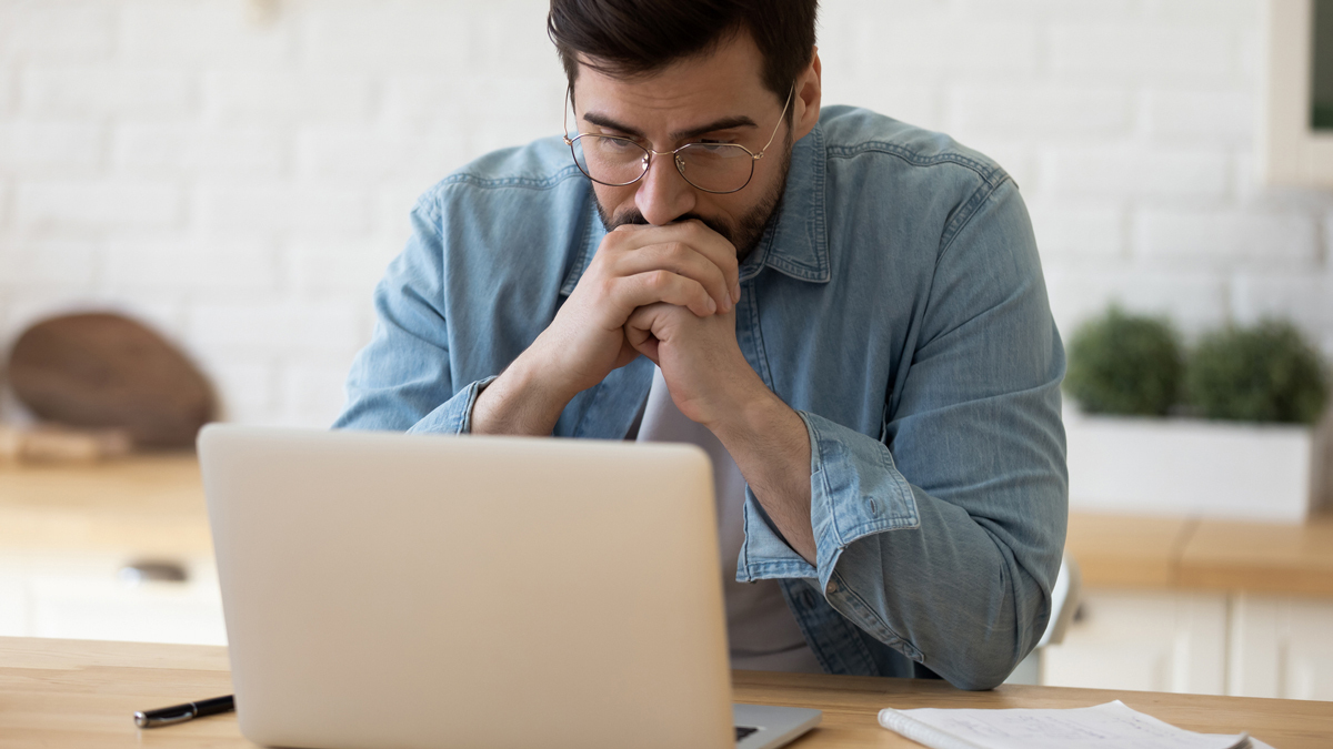 man_looking_at_computer_complaint