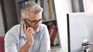 older man on phone choice help