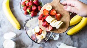 using a blender at home to blend fruit