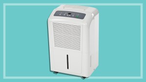white dehumidifier on a teal background