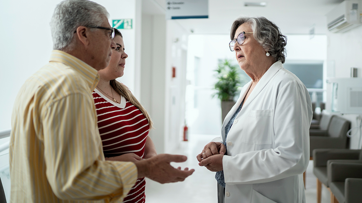 two people talking with their gp