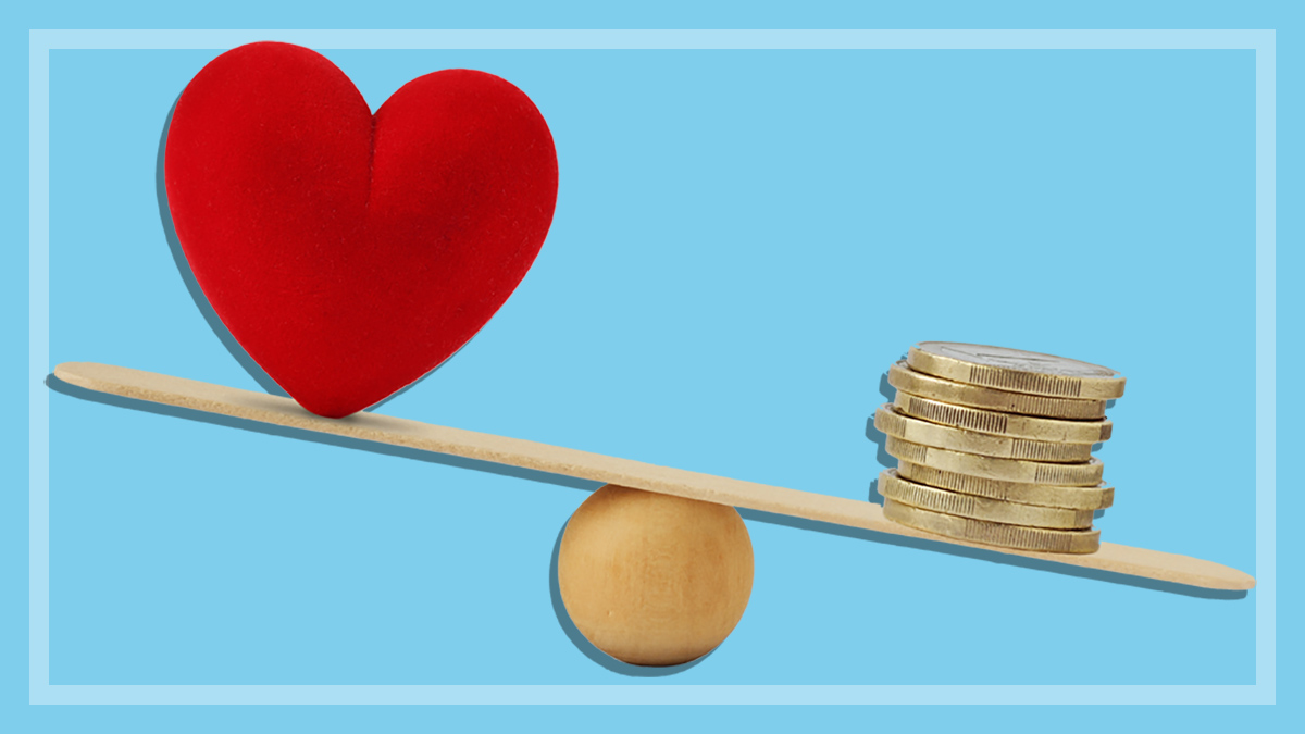 heart and money balancing on a scale