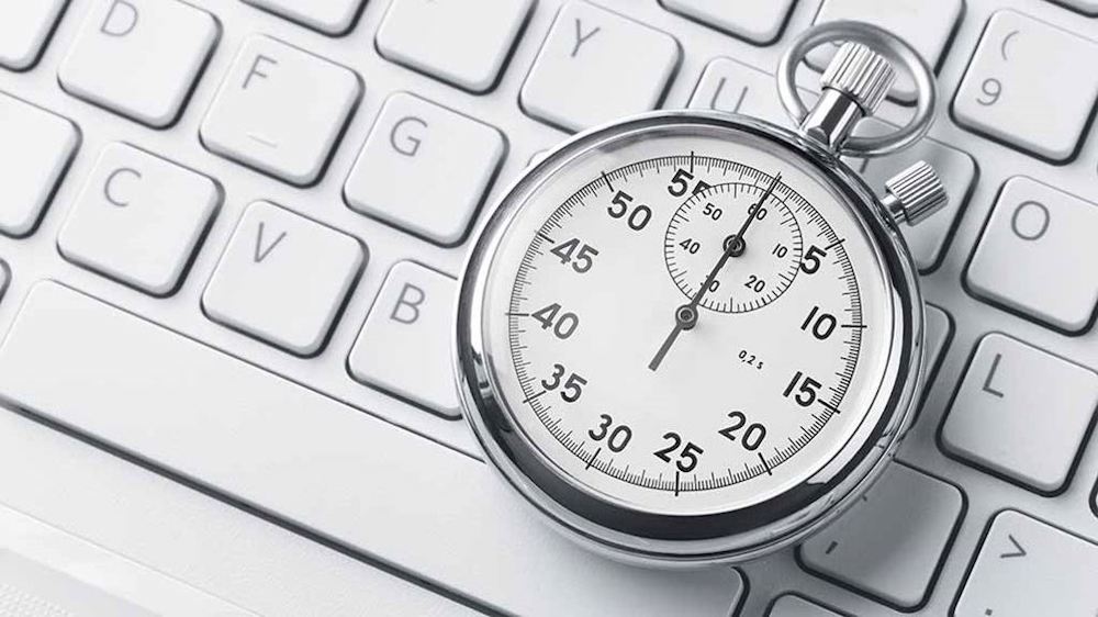 stopwatch on a computer keyboard