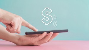 dollar signs finger tapping phone banking app