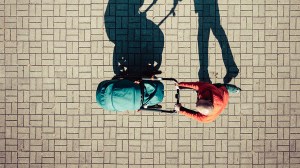 view from above of person pushing a stroller