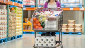 person with large trolley doing their bulk buy shopping