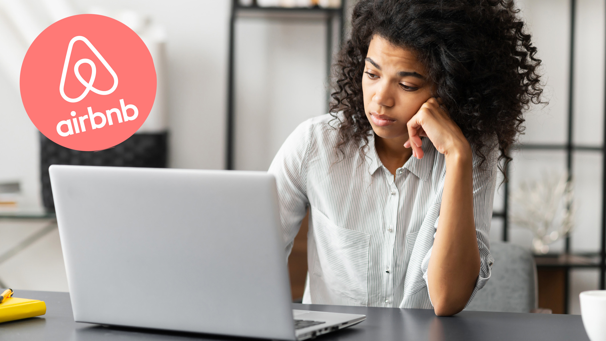 woman on laptop trying to get airbnb refund